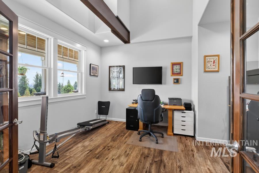 1726 Little Bear Ridge Road Troy, ID 83871 - Photo 28 of 50 French doors, a transom window, exposed beams, and a vaulted ceiling make this office a special place.