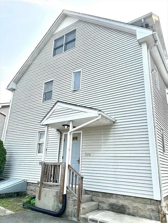 a front view of a house with balcony