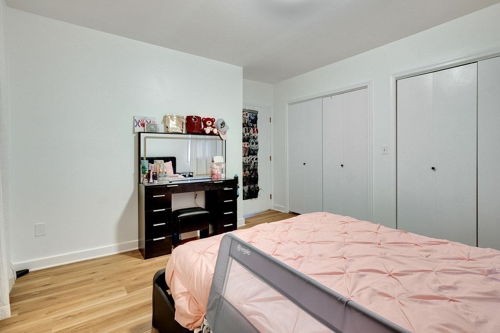 890-892 St James Avenue Springfield, MA 01104 - Photo 25 of 30 a bedroom with a bed and a closet