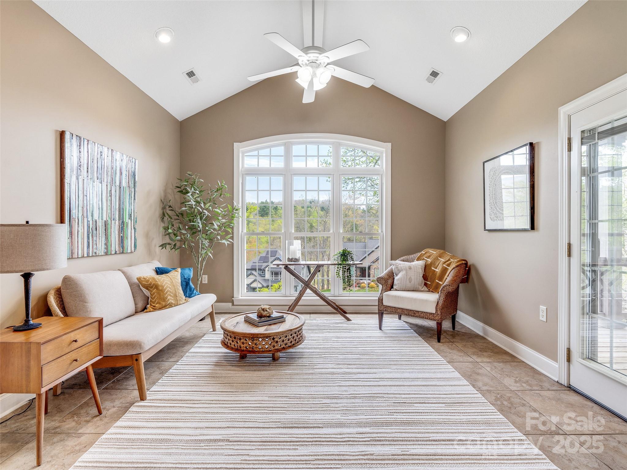 69 Ledgestone Drive Fairview, NC 28730 - Photo 12 of 31 a living room with furniture and a large window
