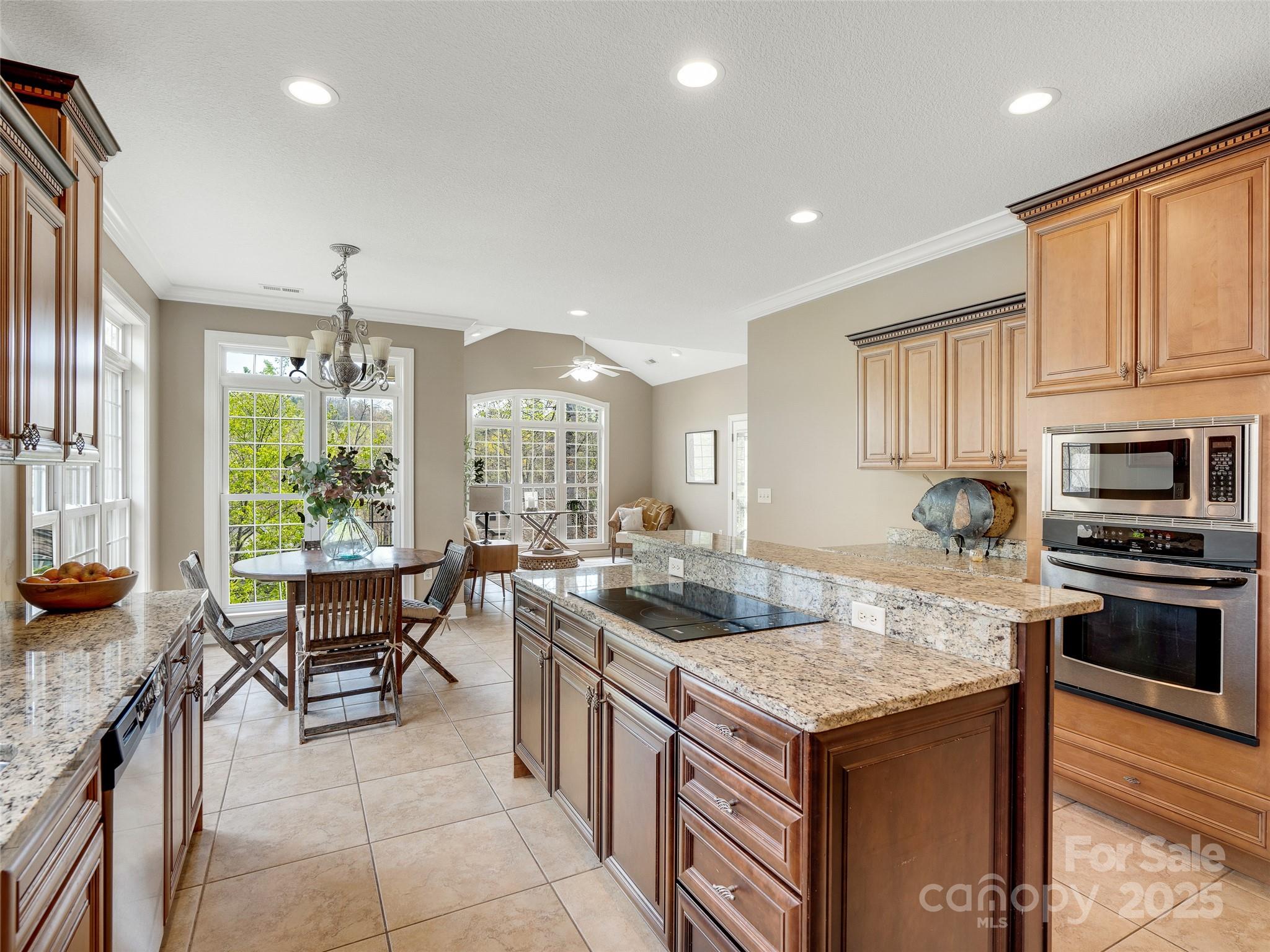 69 Ledgestone Drive Fairview, NC 28730 - Photo 9 of 31 a kitchen with a stove and a refrigerator