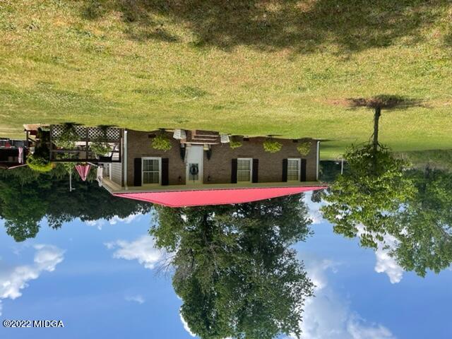 816 Lee King Road Forsyth, GA 31029 - Photo 1 of 15 a view of a house with a yard porch and sitting area