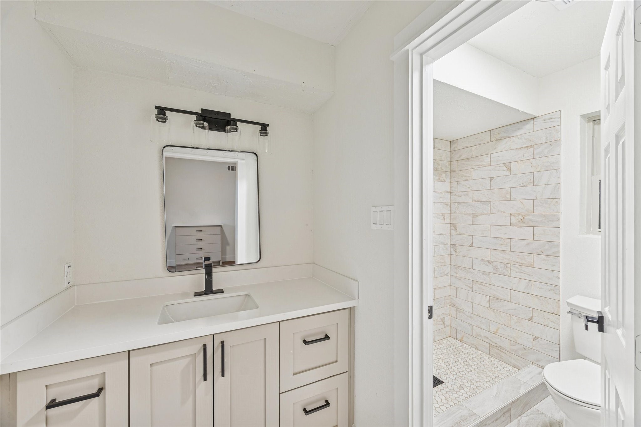 3623 Acorn Way Lane Spring, TX 77389 - Photo 17 of 25 a bathroom with a toilet sink and shower