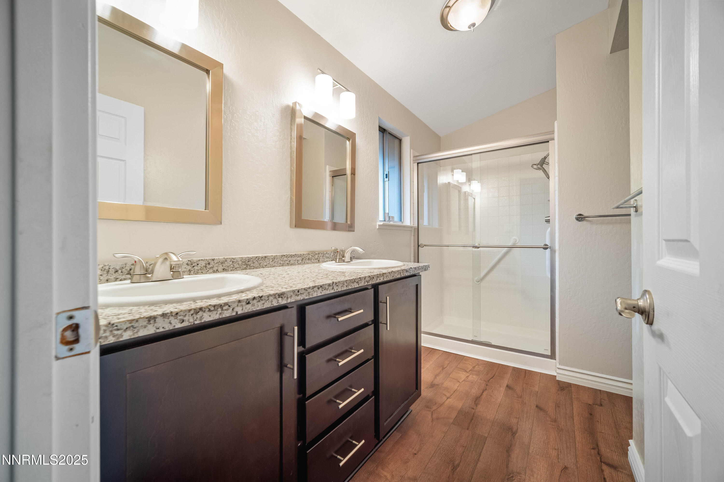 1146 Ambassador Drive Reno, NV 89523 - Photo 12 of 23 a bathroom with a granite countertop sink toilet and shower