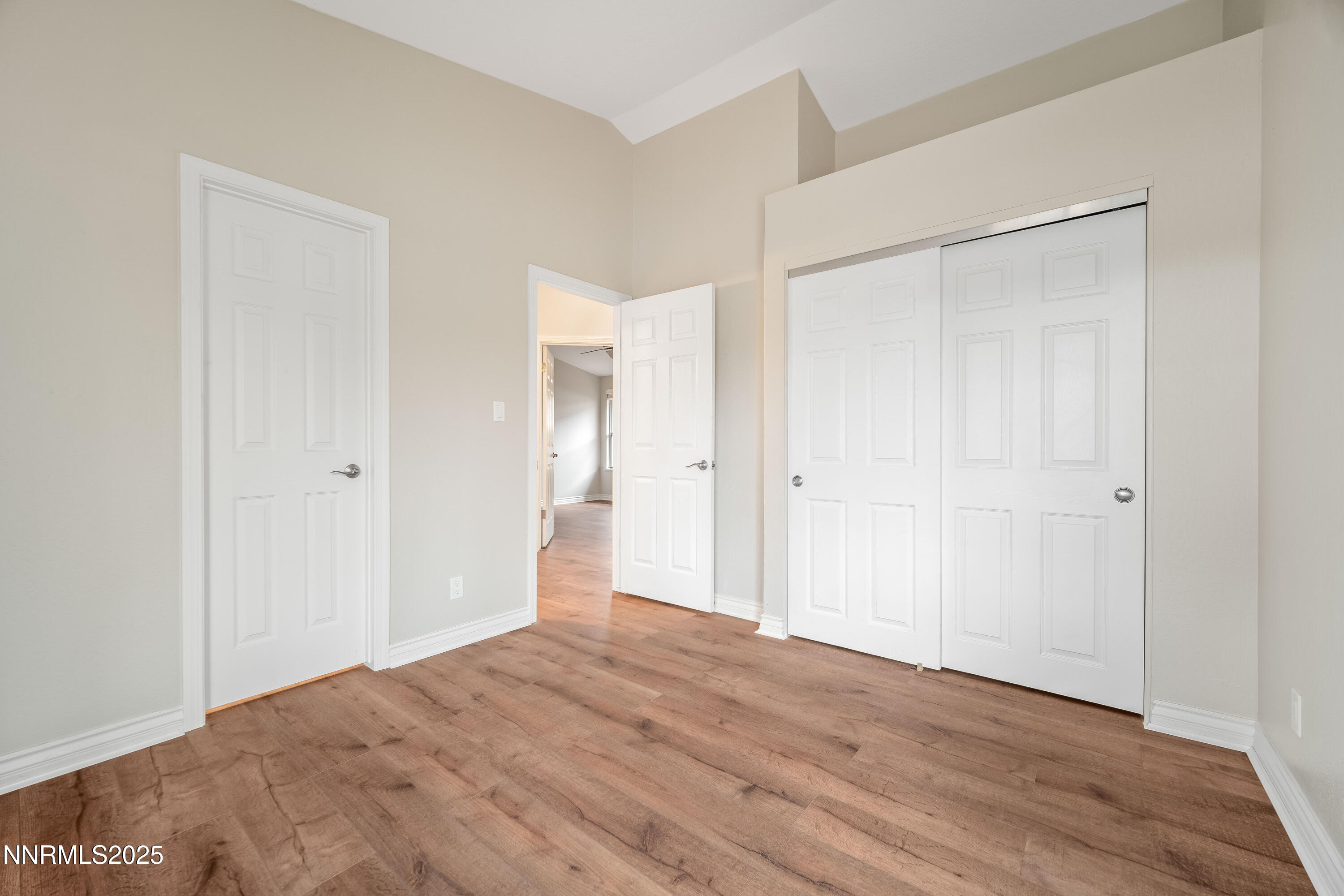 1146 Ambassador Drive Reno, NV 89523 - Photo 14 of 23 a view of a room with wooden floor