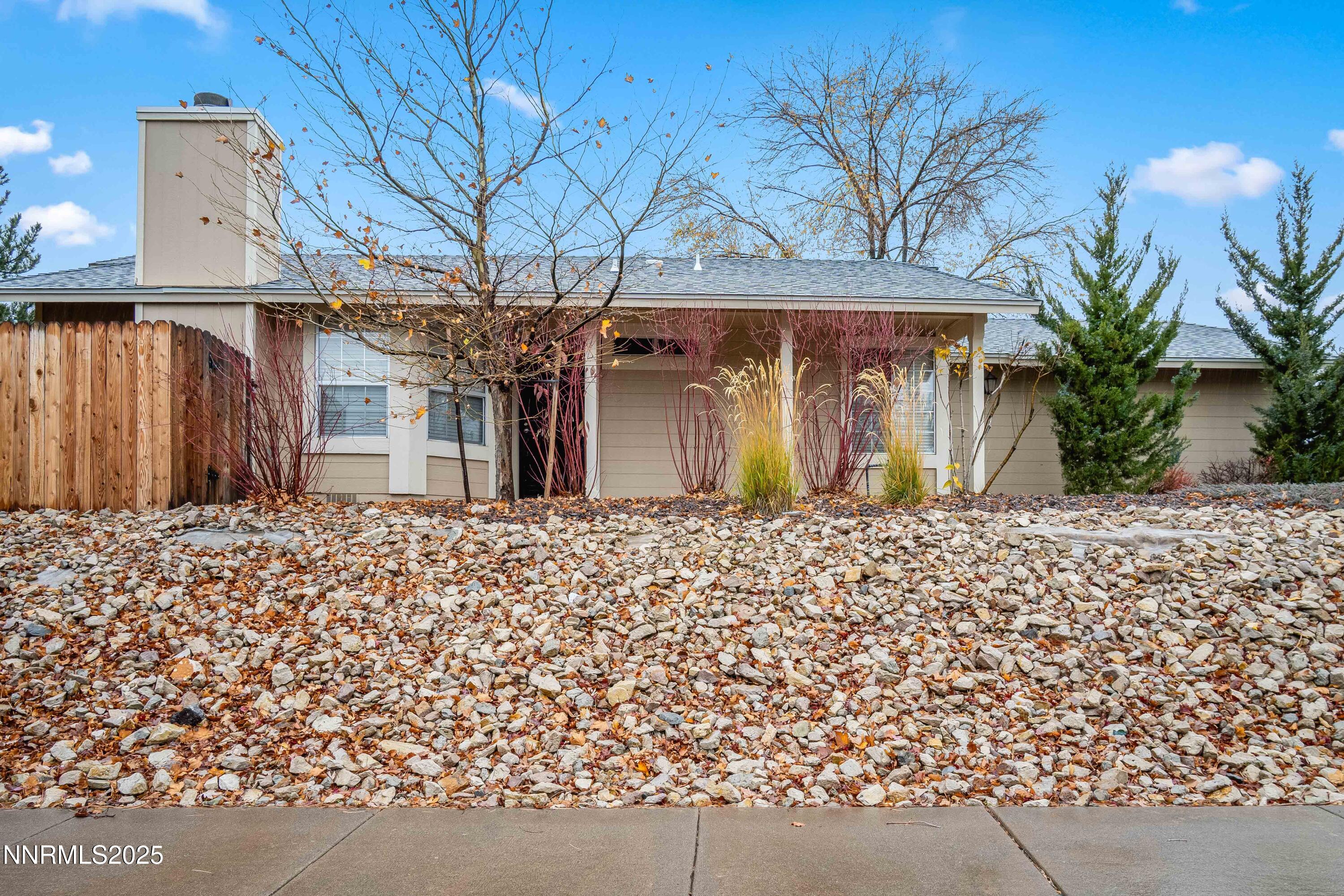 1146 Ambassador Drive Reno, NV 89523 - Photo 18 of 23 a front view of a house with garden