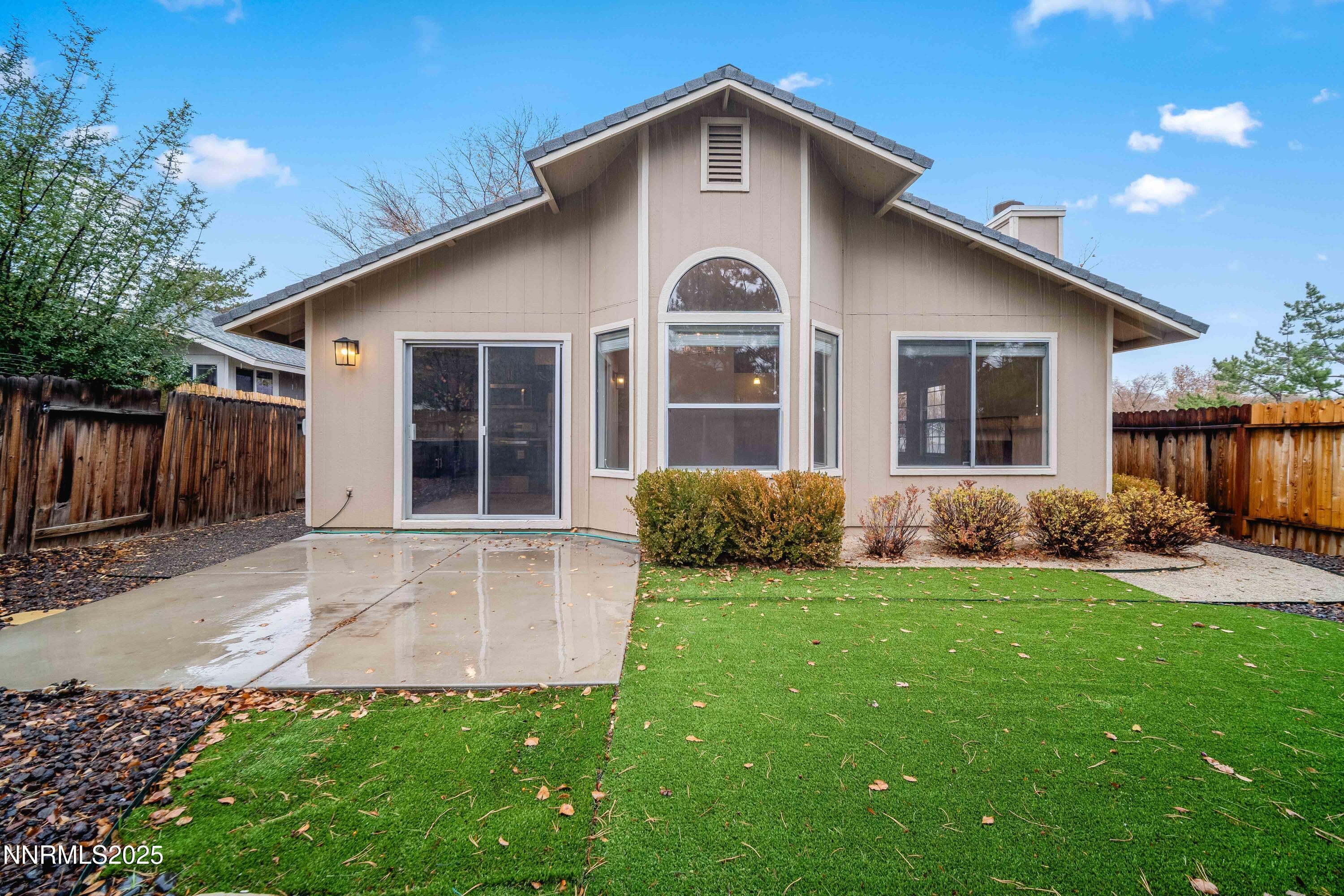1146 Ambassador Drive Reno, NV 89523 - Photo 20 of 23 a front view of house with yard and green space