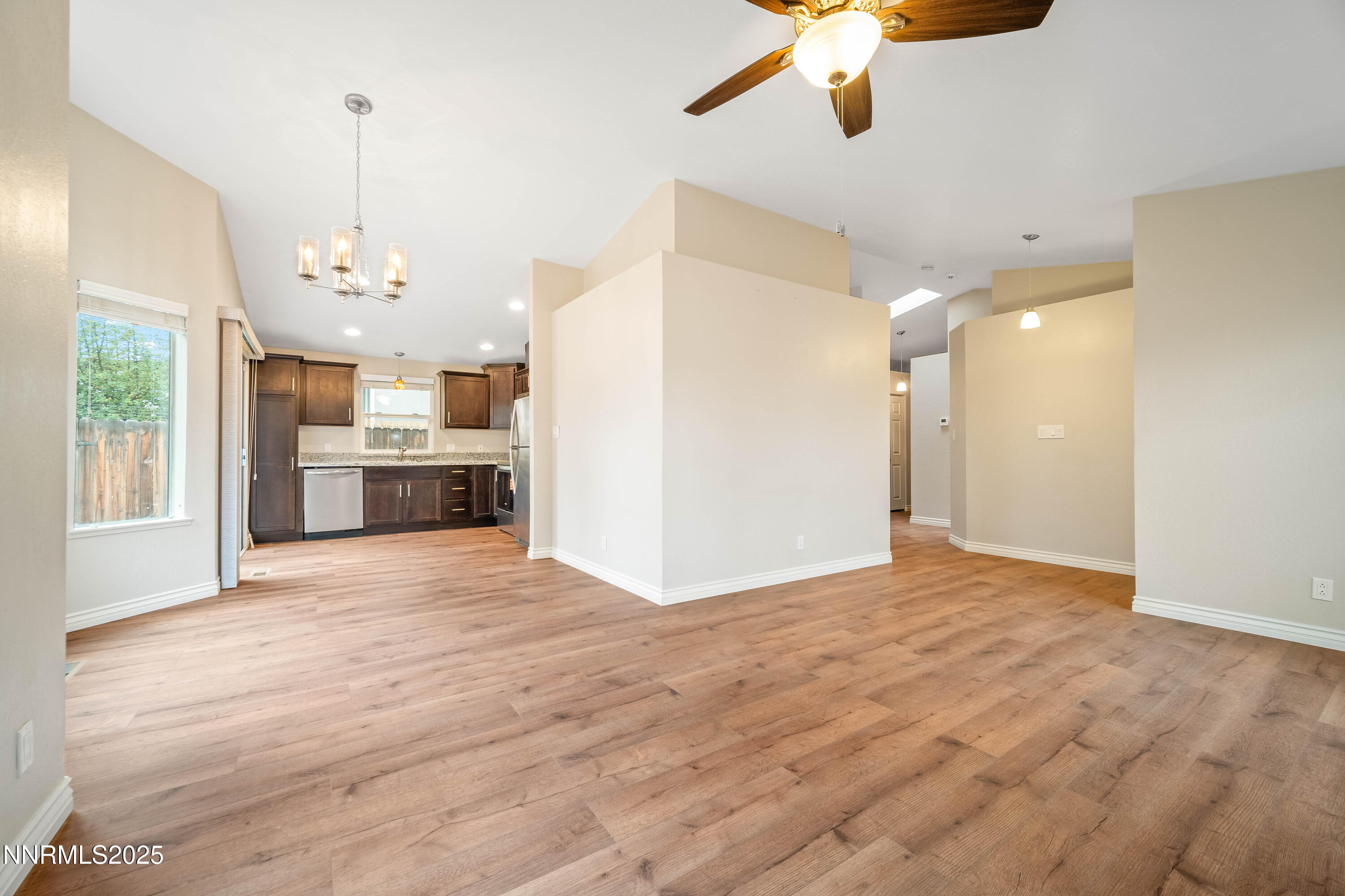 1146 Ambassador Drive Reno, NV 89523 - Photo 4 of 23 a view of a kitchen with a sink and a refrigerator