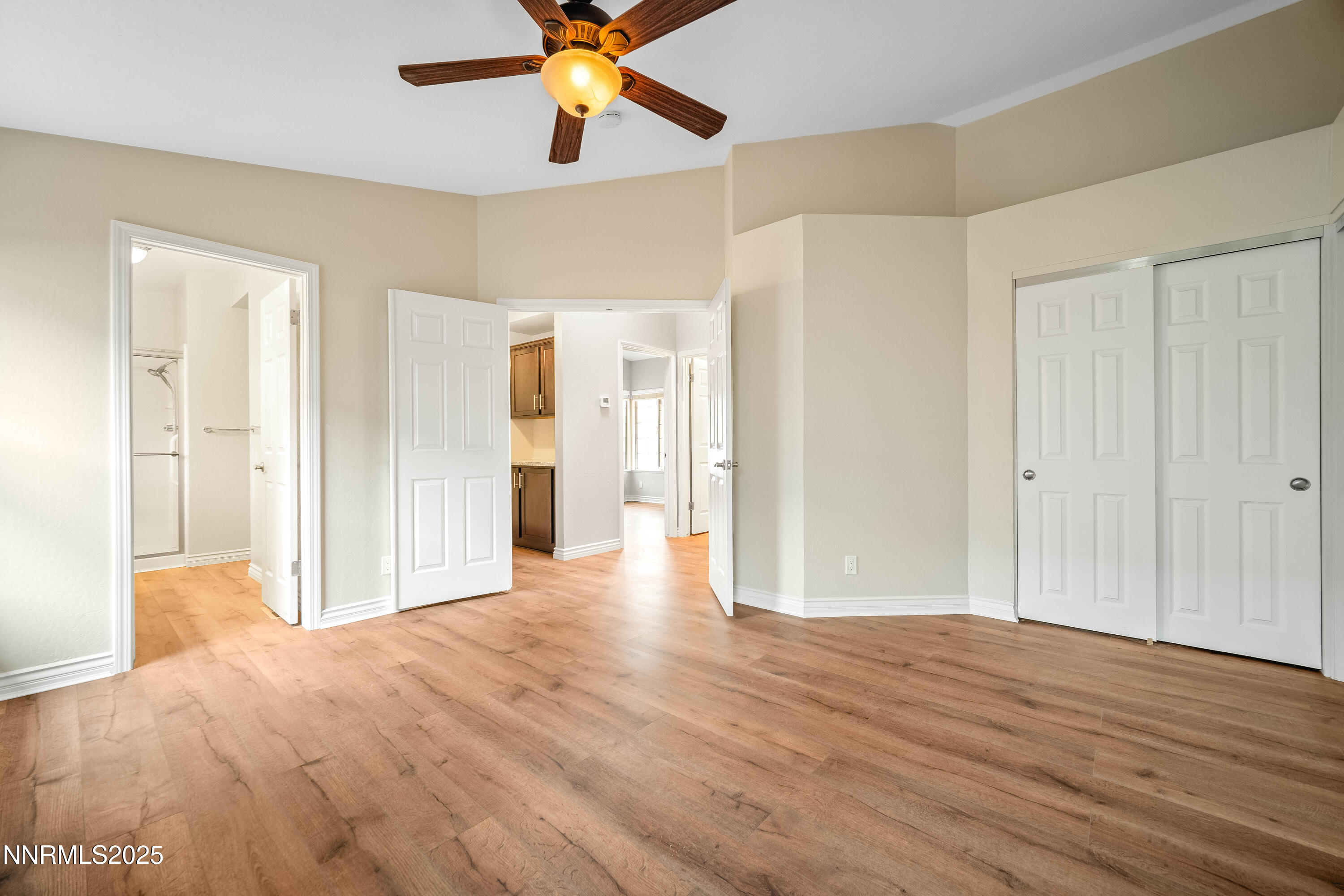 1146 Ambassador Drive Reno, NV 89523 - Photo 10 of 23 a view of livingroom with hardwood floor and ceiling fan