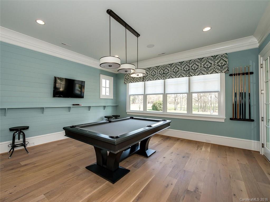 8405 Eagle Glen Charlotte, NC 28210 - Photo 15 of 24 a room with pool table and windows