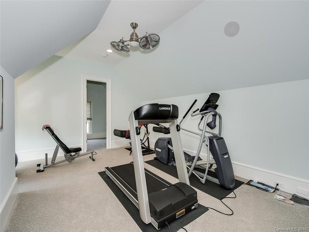8405 Eagle Glen Charlotte, NC 28210 - Photo 16 of 24 a view of a room with gym equipment