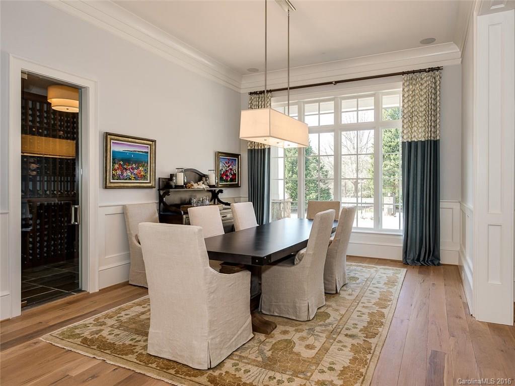 8405 Eagle Glen Charlotte, NC 28210 - Photo 3 of 24 a view of a dining room with furniture window and wooden floor