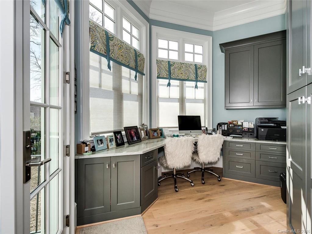 8405 Eagle Glen Charlotte, NC 28210 - Photo 10 of 24 a room with a large window and chairs