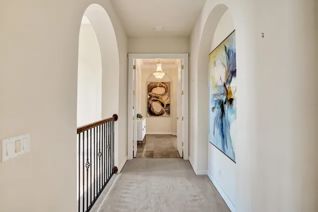 a view of a hallway view with windows