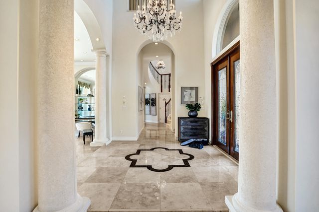 a view of a livingroom with furniture and windows