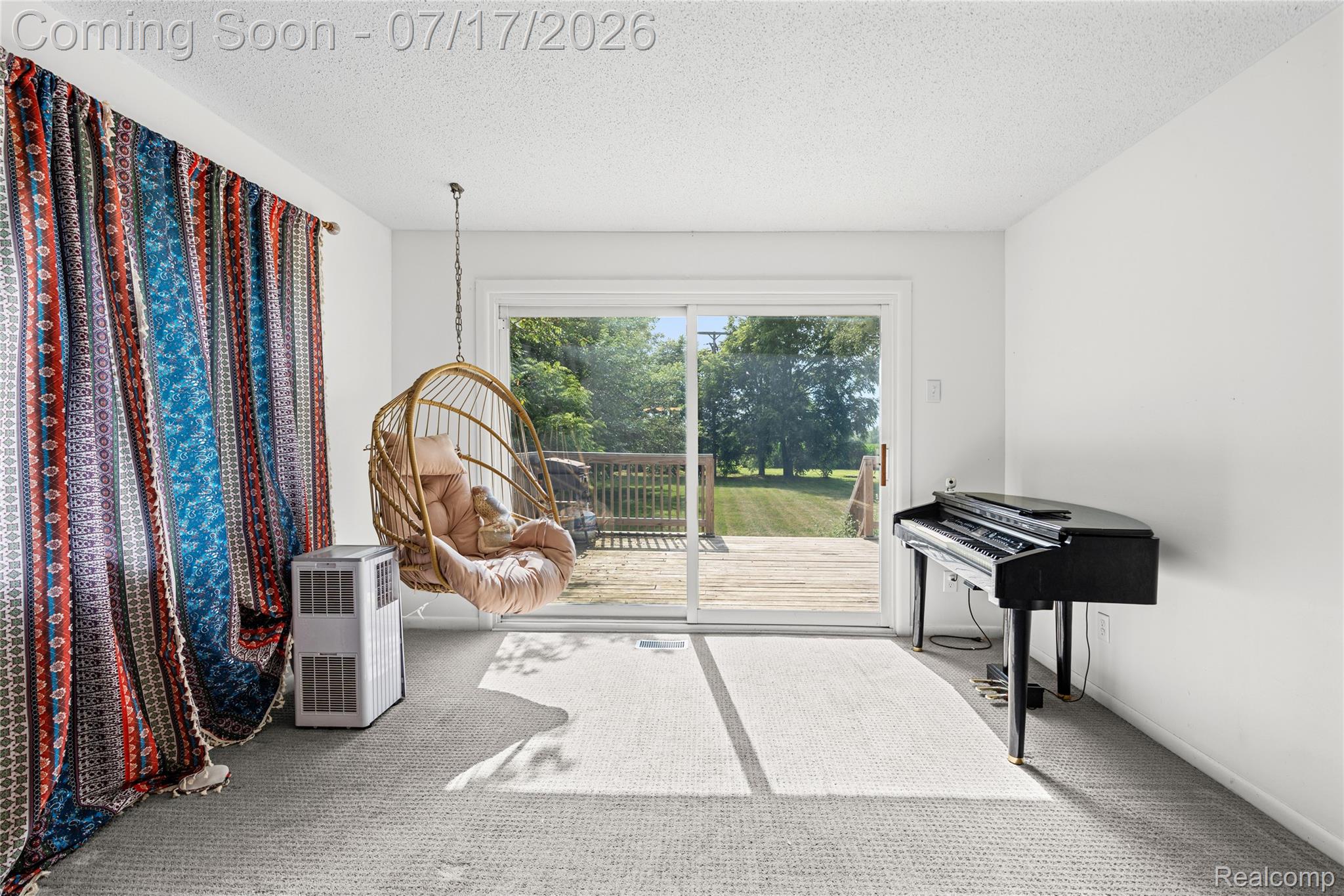 9204 Bray Road Millington, MI 48746 - Photo 4 of 14 Sliding glass door leading to an outdoor deck