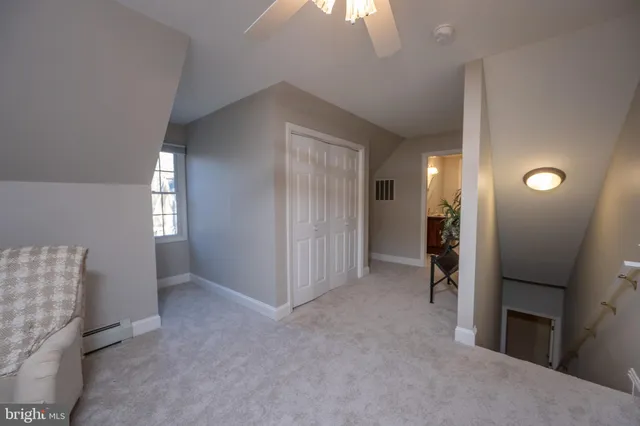 a living room with furniture and window