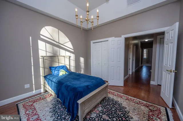 a view of a dining room with furniture wooden floor and a rug