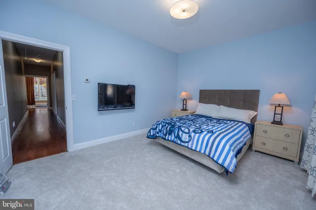 a view of a balcony with wooden floor and outdoor space