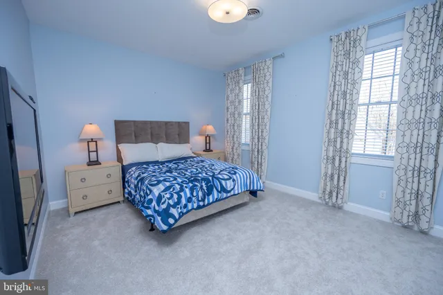 a backyard of a house with outdoor seating