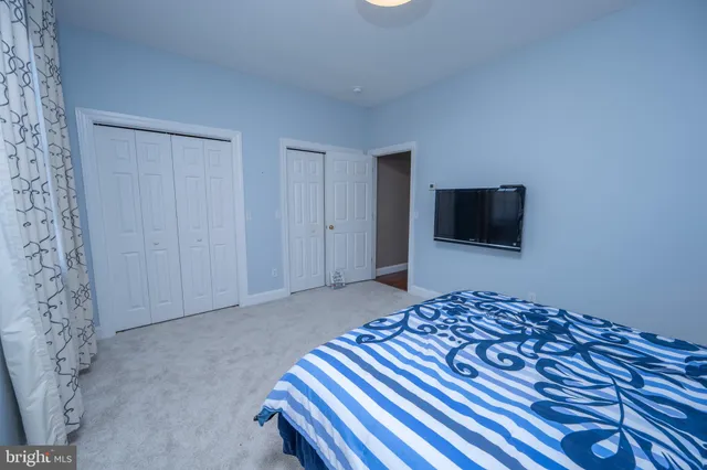 a view of balcony with wooden floor and fence