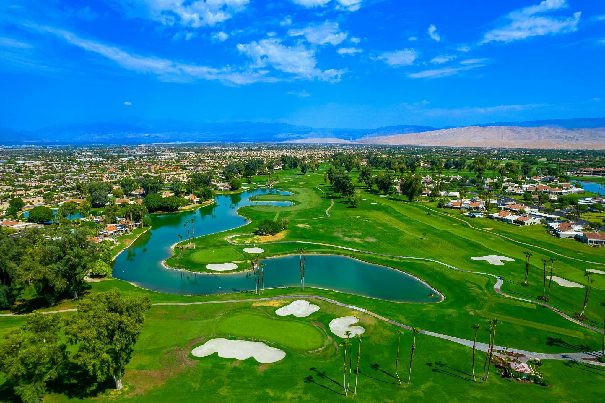 38 Mission Court Rancho Mirage, CA 92270 - Photo 16 of 61 a view of a golf course with a swimming pool
