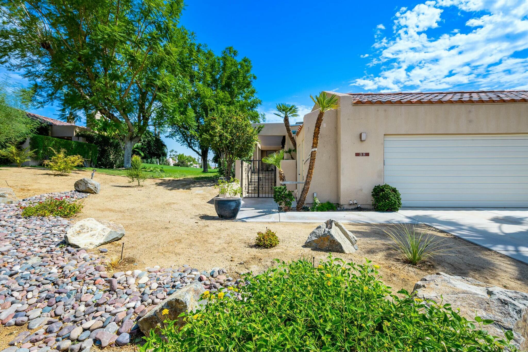 38 Mission Court Rancho Mirage, CA 92270 - Photo 17 of 61 a view of a house with snow on the road