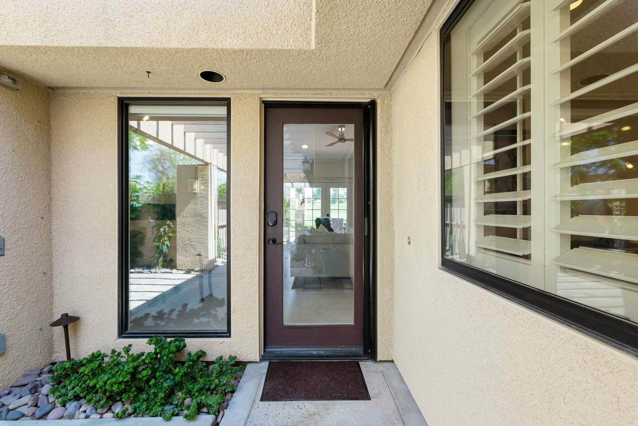 38 Mission Court Rancho Mirage, CA 92270 - Photo 23 of 61 a view of a door and a window