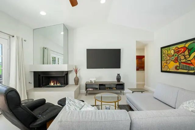 a kitchen with stainless steel appliances a stove sink and refrigerator