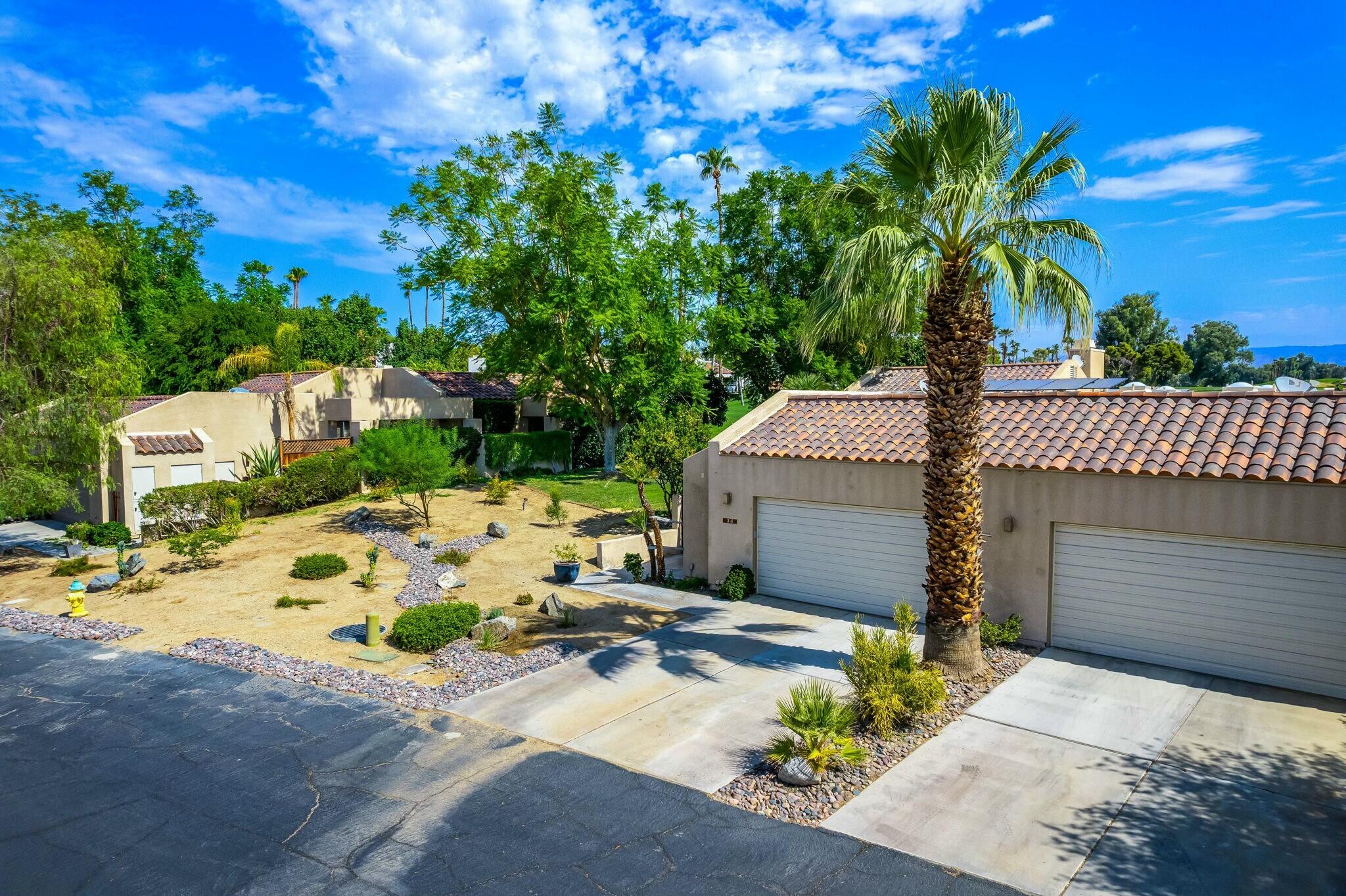 38 Mission Court Rancho Mirage, CA 92270 - Photo 3 of 61 a view of backyard of a house with outdoor seating