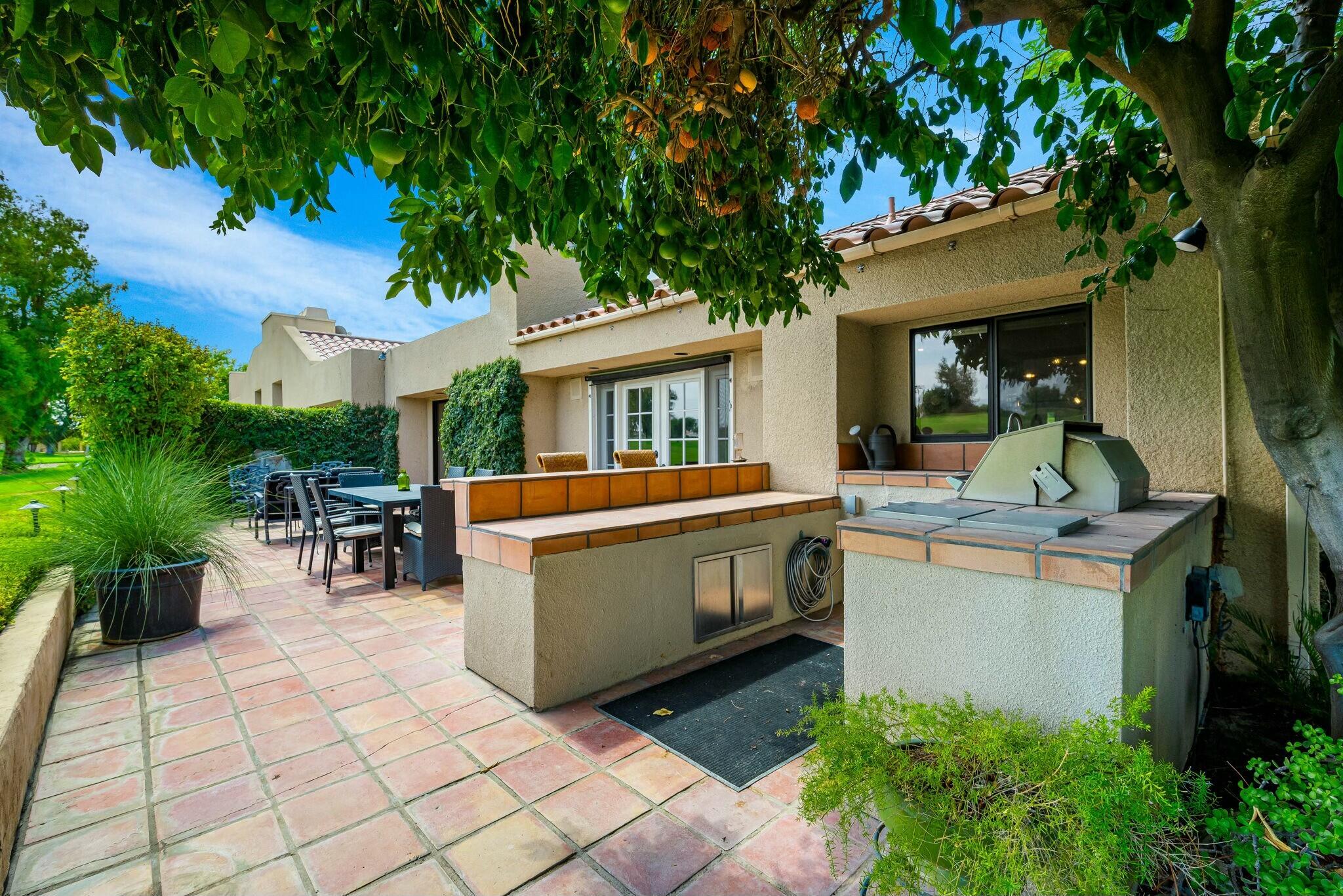 38 Mission Court Rancho Mirage, CA 92270 - Photo 45 of 61 a view of house with a backyard and patio