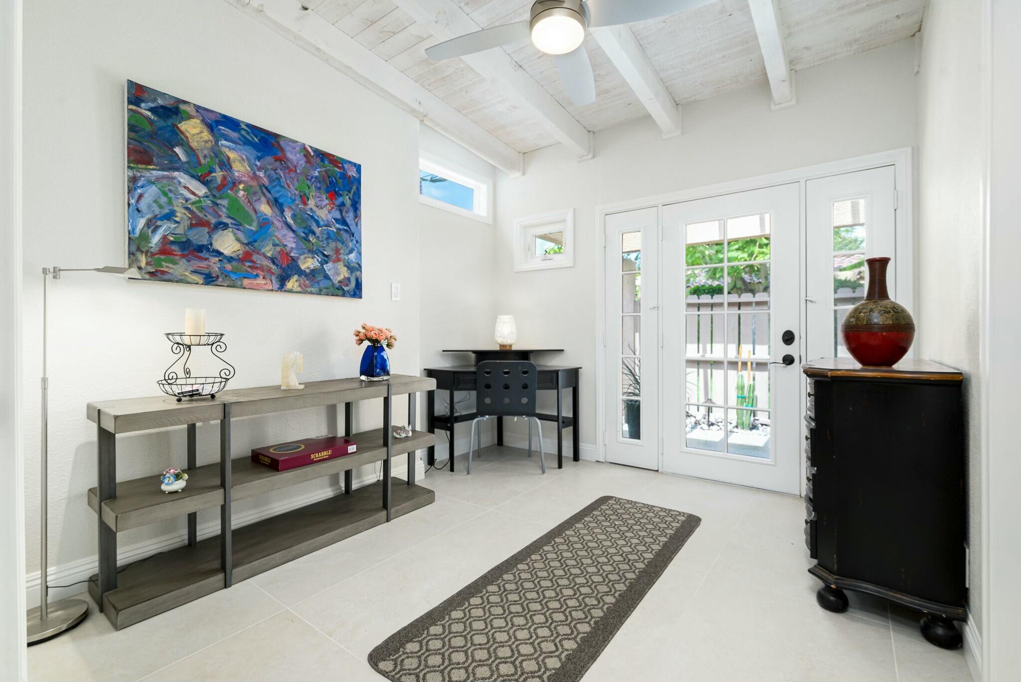 38 Mission Court Rancho Mirage, CA 92270 - Photo 59 of 61 a living room with furniture and a rug
