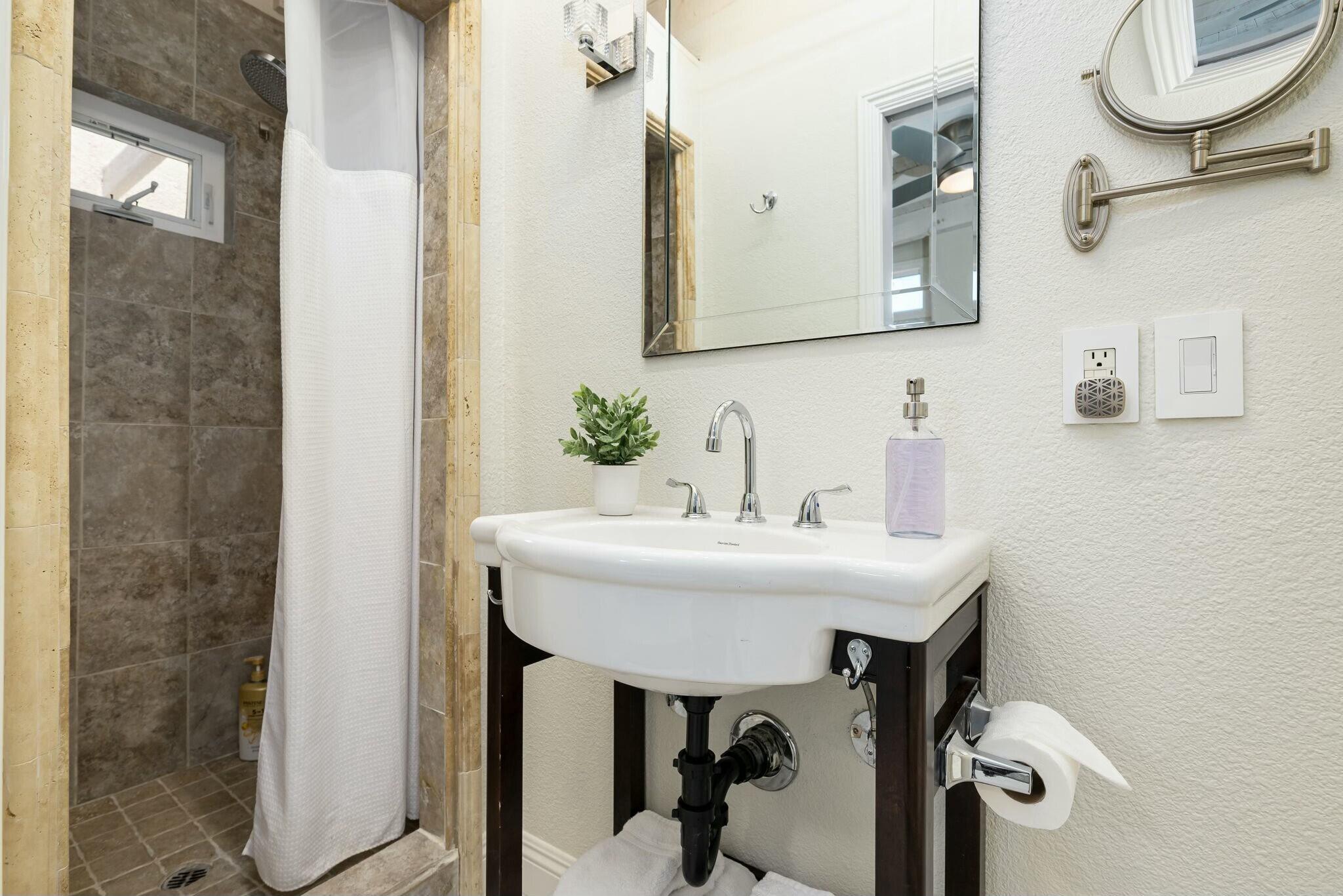 38 Mission Court Rancho Mirage, CA 92270 - Photo 60 of 61 a bathroom with a sink and a mirror