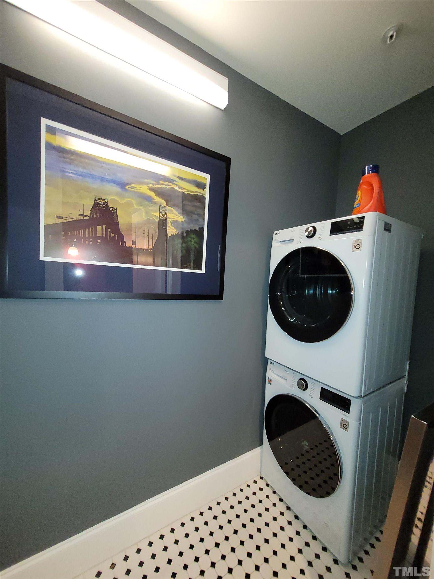 710 Independence Place, Unit 208/2C Raleigh, NC 27603 - Photo 15 of 29 a utility room with dryer and washer