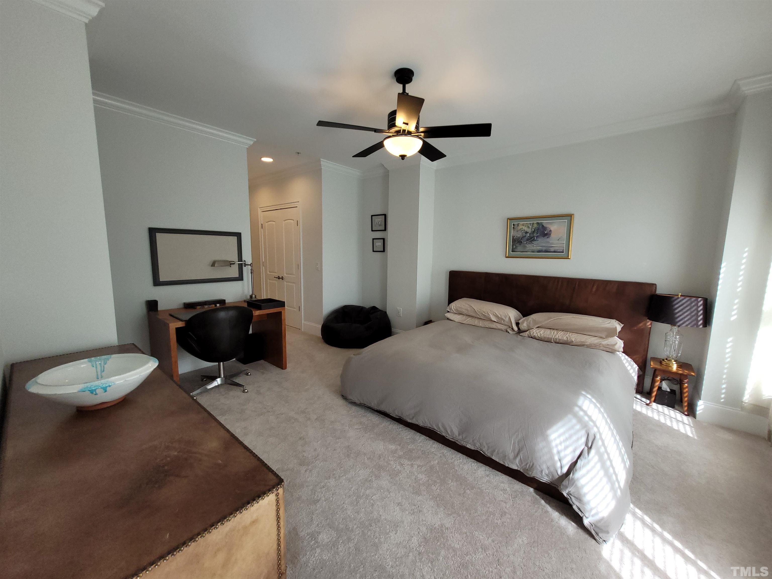 710 Independence Place, Unit 208/2C Raleigh, NC 27603 - Photo 5 of 29 a bedroom with bed and window