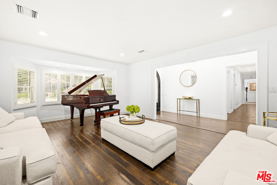 4844 Commonwealth Avenue La Canada Flintridge, CA 91011 - Photo 11 of 43 a living room with furniture and wooden floor