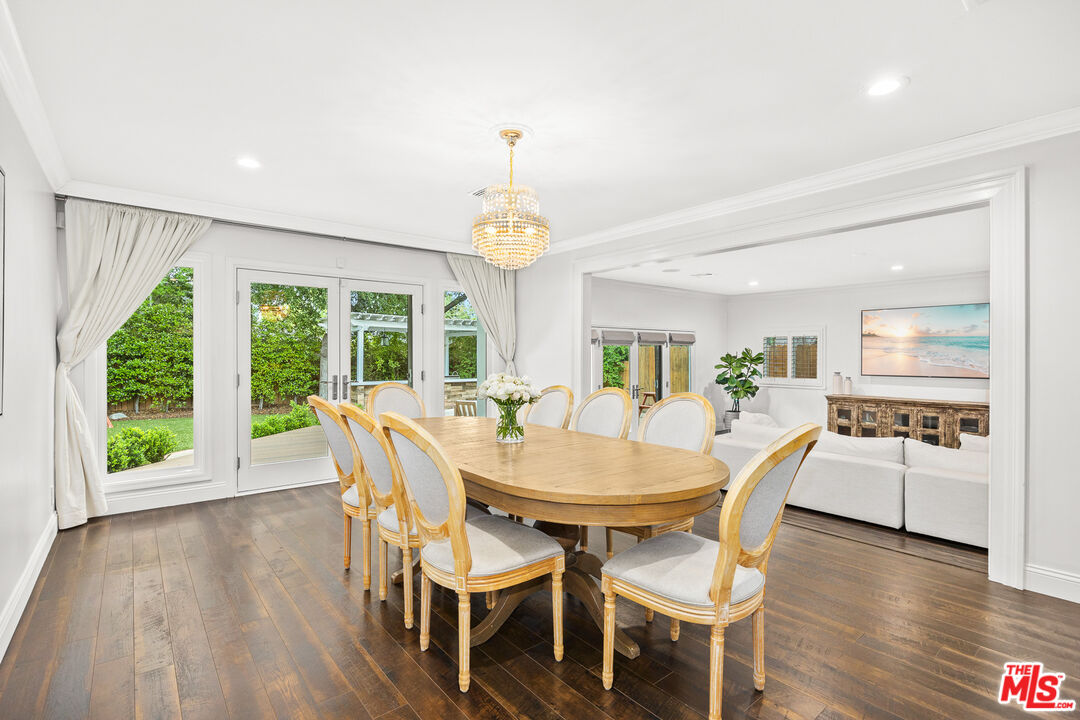 4844 Commonwealth Avenue La Canada Flintridge, CA 91011 - Photo 15 of 43 a dining room with furniture window wooden floor