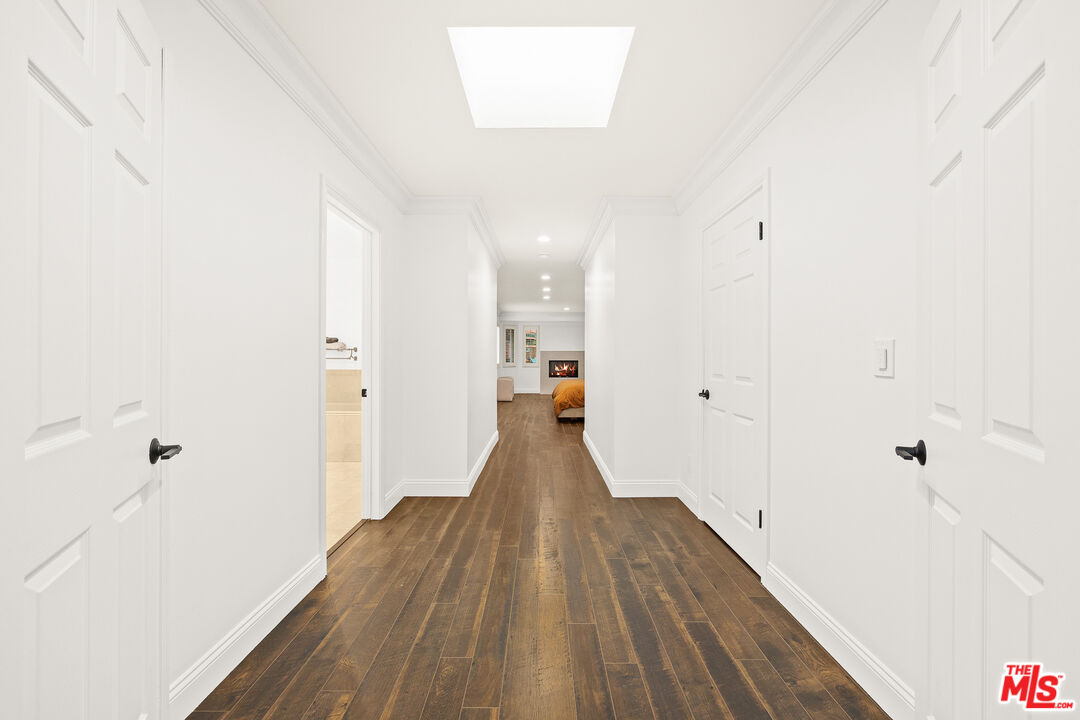 4844 Commonwealth Avenue La Canada Flintridge, CA 91011 - Photo 26 of 43 a view of a hallway with wooden floor