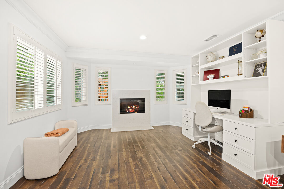 4844 Commonwealth Avenue La Canada Flintridge, CA 91011 - Photo 30 of 43 a workspace with furniture hardwood and a window