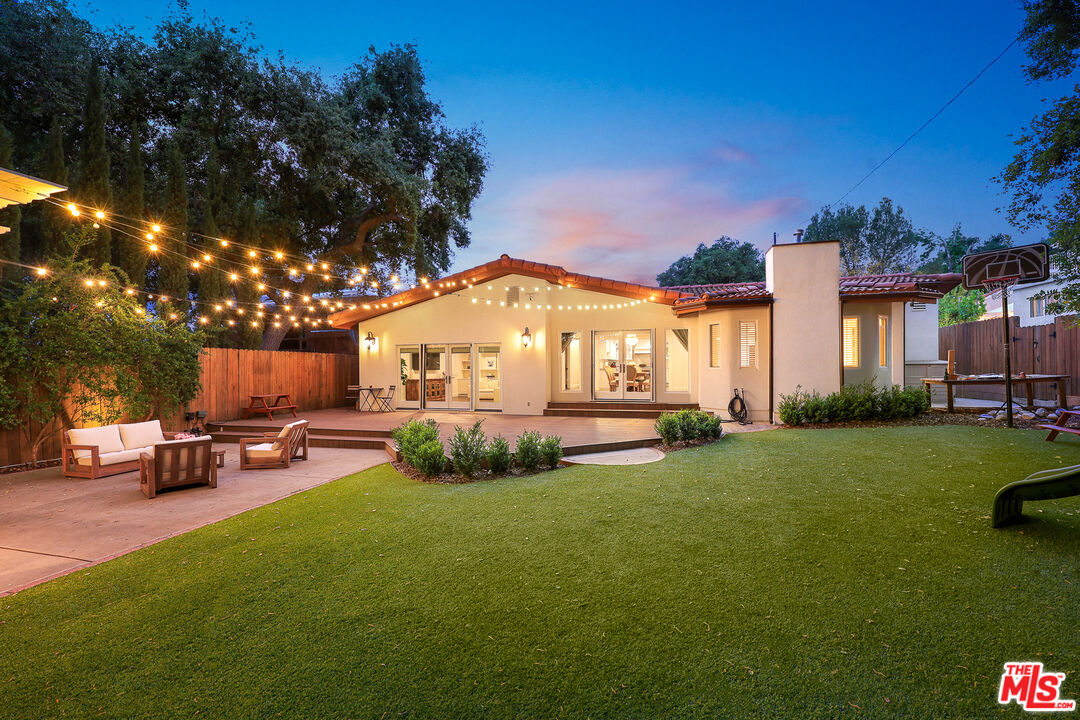 4844 Commonwealth Avenue La Canada Flintridge, CA 91011 - Photo 35 of 43 a view of a house with backyard and sitting area