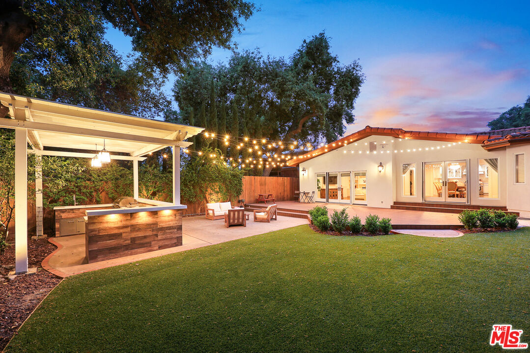 4844 Commonwealth Avenue La Canada Flintridge, CA 91011 - Photo 38 of 43 a view of a house with backyard porch and sitting area