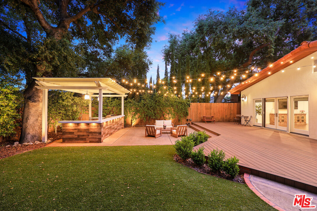 4844 Commonwealth Avenue La Canada Flintridge, CA 91011 - Photo 39 of 43 a view of a house with backyard porch and sitting area