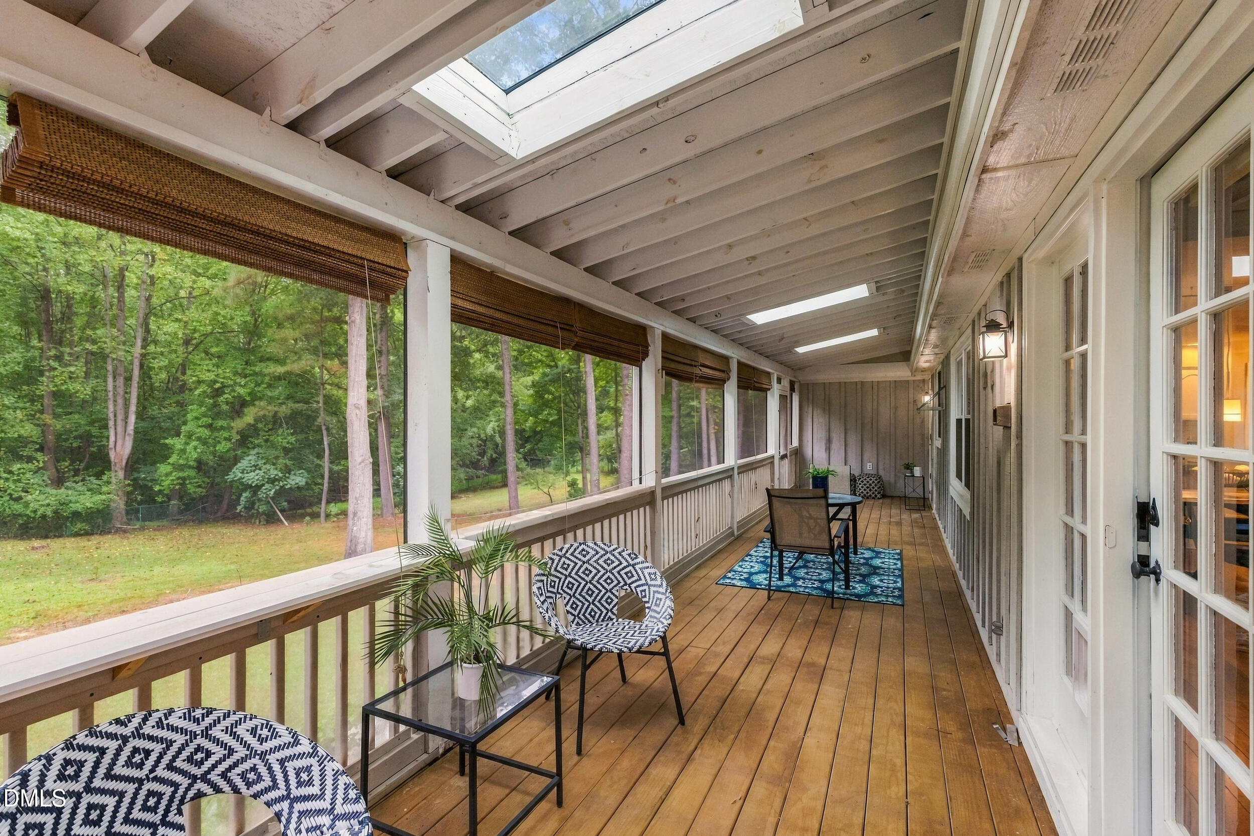 2329 Win Road Garner, NC 27529 - Photo 23 of 90 Screened porch with wood-finish flooring, skylights, and multiple French doors