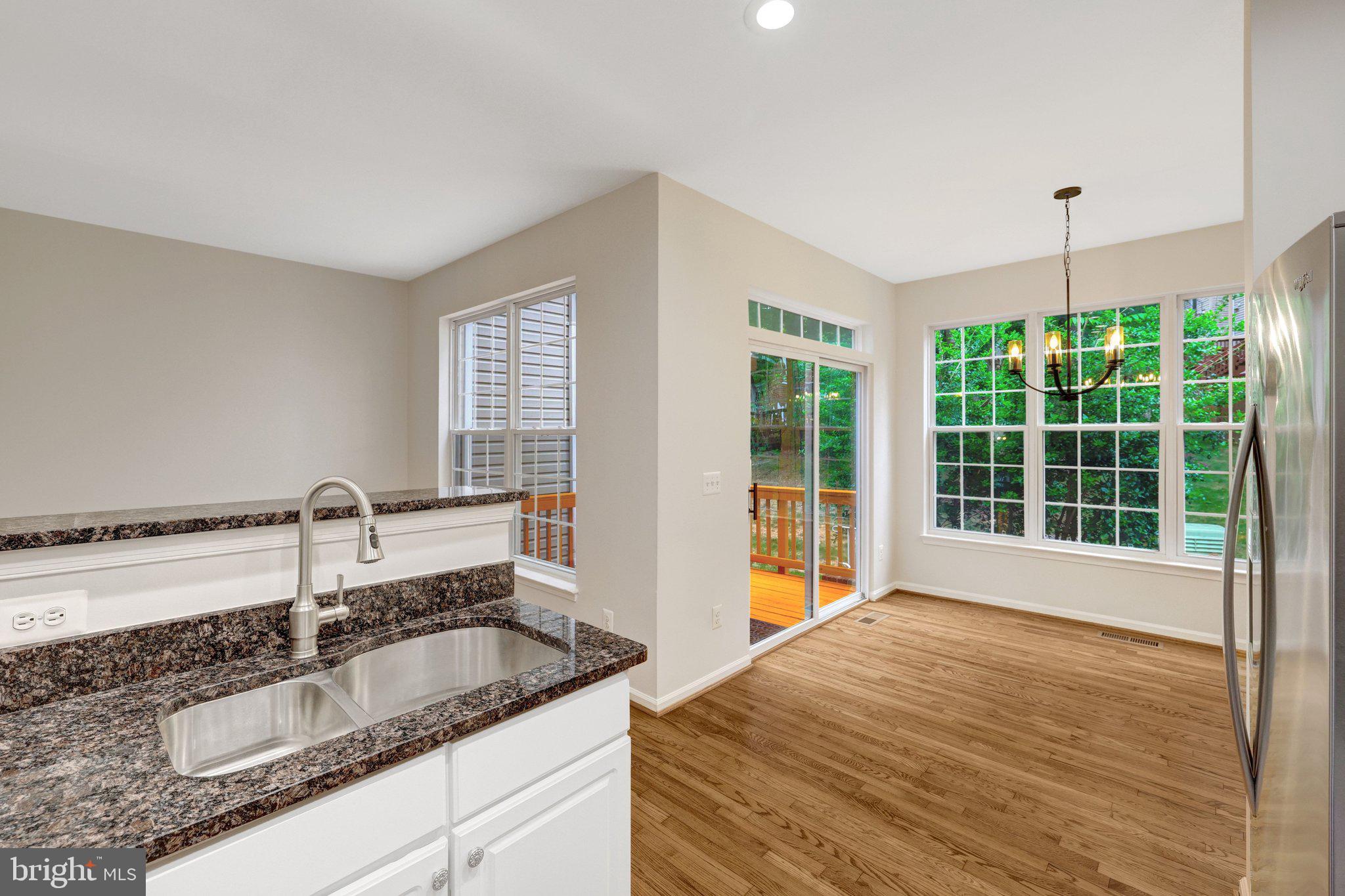 1268 Wild Hawthorn Way Reston, VA 20194 - Photo 22 of 55 Bright Breakfast Room w/ access to the rear deck