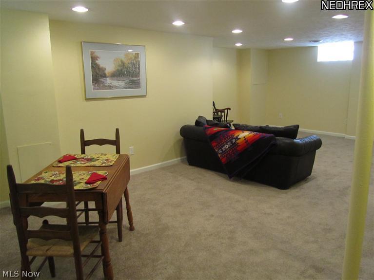 1325 Sunset Road Cleveland, OH 44124 - Photo 14 of 17 Basement, was refinished with drywall, ceiling and can lighting so it feels like a first-floor room. Large enough for seating, dining and play areas.