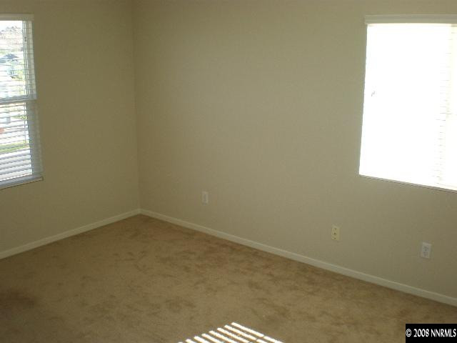 7887 Tulear Street Reno, NV 89506 - Photo 8 of 9 an empty room with a window