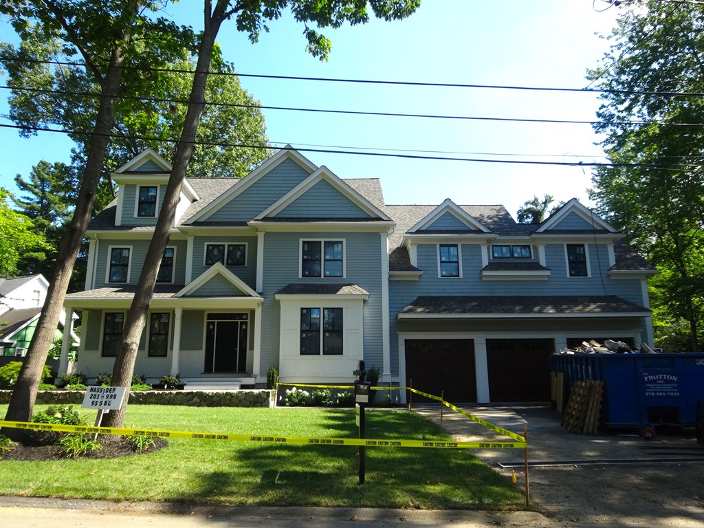 14 Hamblen Street Lexington, MA 02421 - Photo 29 of 29 a front view of a house with a yard