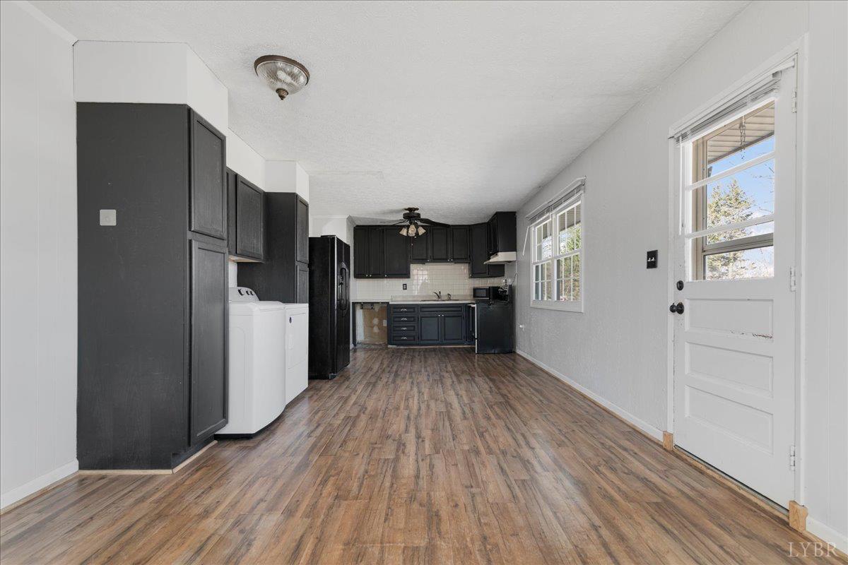 813 Doss Road Concord, VA 24538 - Photo 12 of 31 a view of kitchen with wooden floor electronic appliances and cabinets