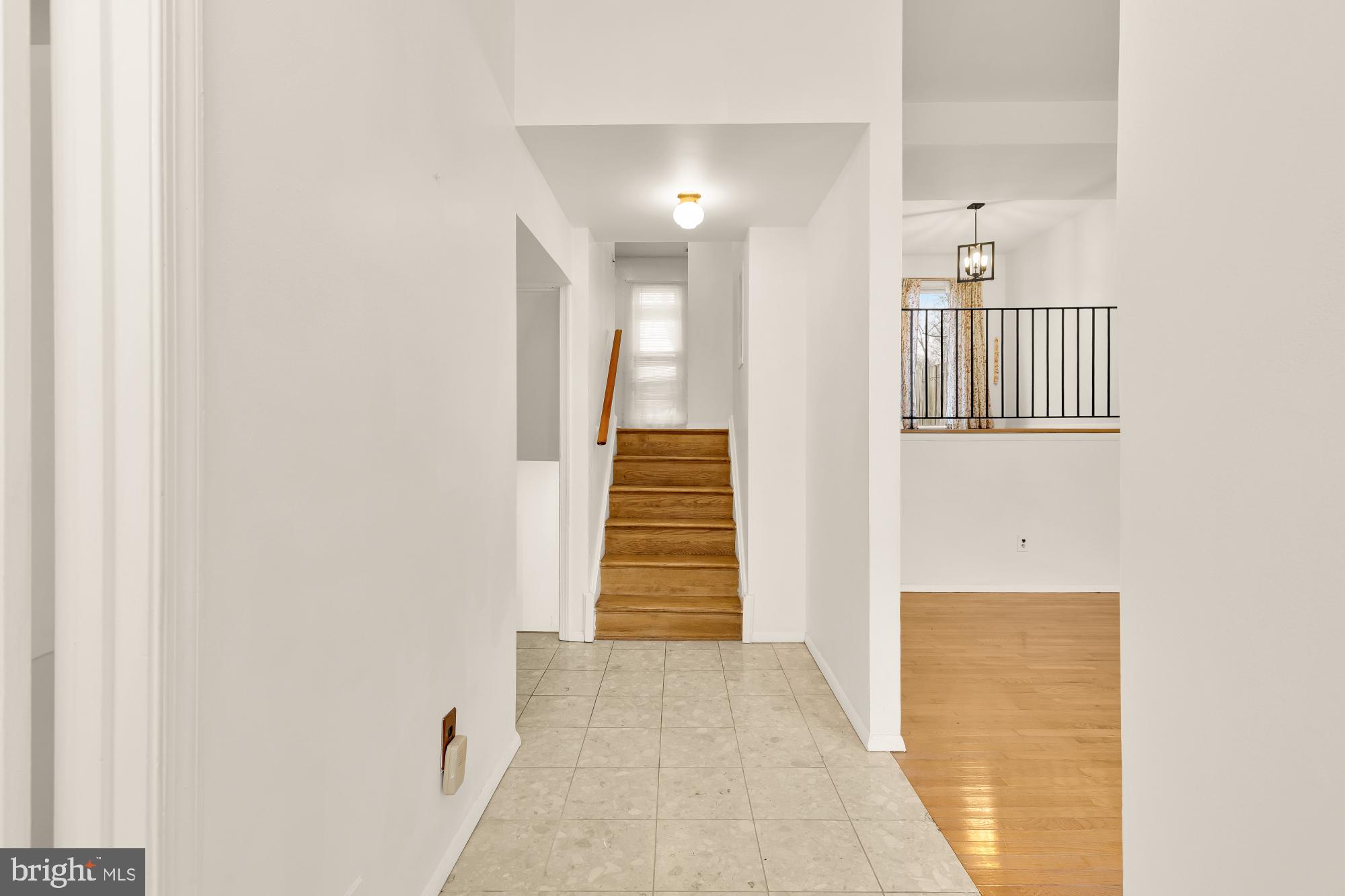 7149 Mill Run Drive, Unit 155 Rockville, MD 20855 - Photo 2 of 22 a view of hallway with stairs