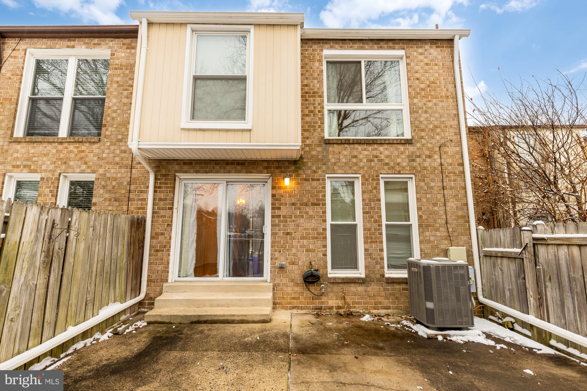 7149 Mill Run Drive, Unit 155 Rockville, MD 20855 - Photo 22 of 22 front view of a brick house with a large window